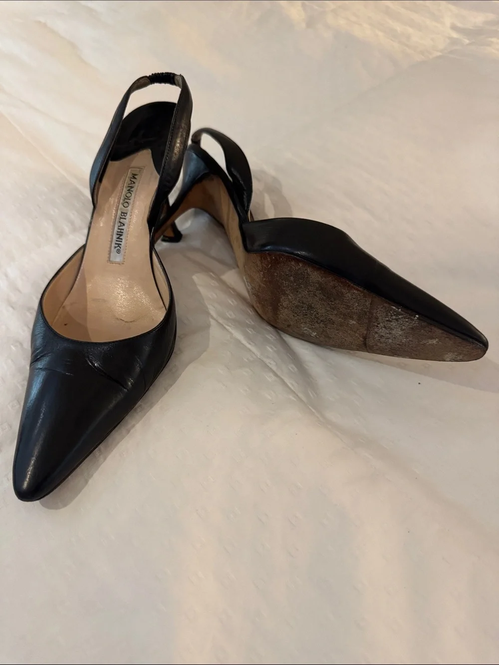 Manolo Blahnik “Carolyne” Black Pointed-Toe Slingback Heels